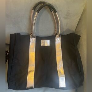 Weekender Tote from Victoria’s Secret. Black with rose gold straps.